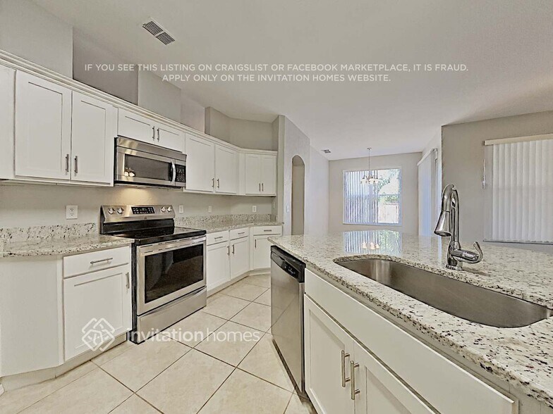 Building Photo - 5722 Magnolia Bloom Terrace