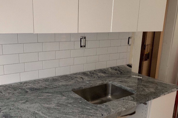 New granite and cabinets - 23 Union Ave