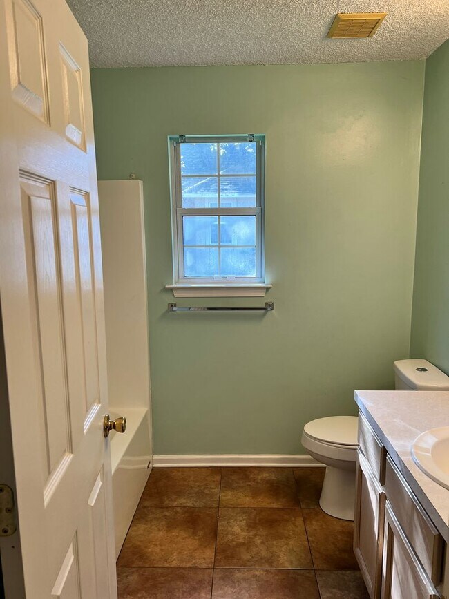 Building Photo - Four bedroom with a fenced in yard!