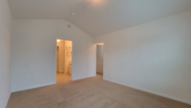Building Photo - "Modern 3-Bedroom Multiplex with 3 Full Ba...