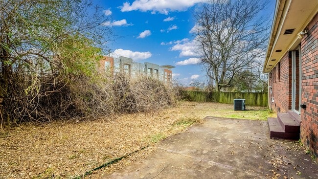 Building Photo - Updated 3BR/2BA Brick Home with Hardwood Floors & Large Yard