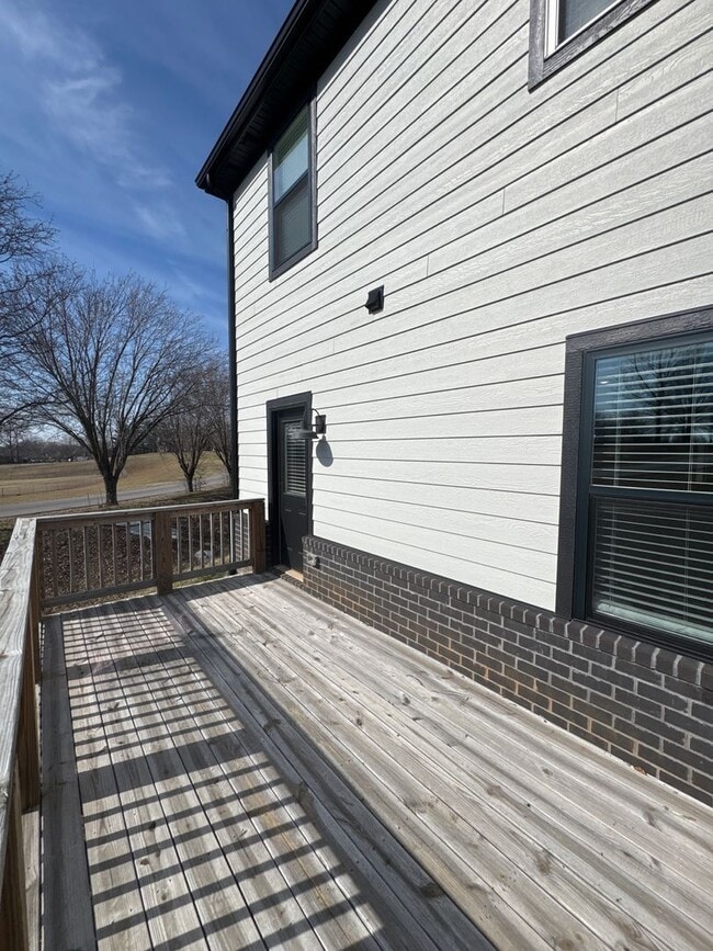 Building Photo - “Stylish 3BR End-Unit | Open Concept | Quartz Kitchen | Garage + Deck