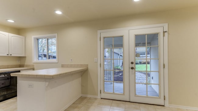 Building Photo - Charming 2 Bedroom 1 Bathroom Bungalow with Oversized 1 Car Garage and Large Manicured  Backyard ...