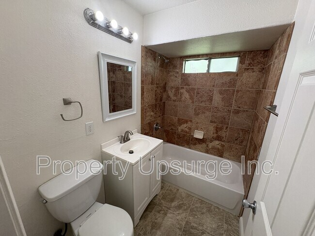 Building Photo - 104 E 6th St