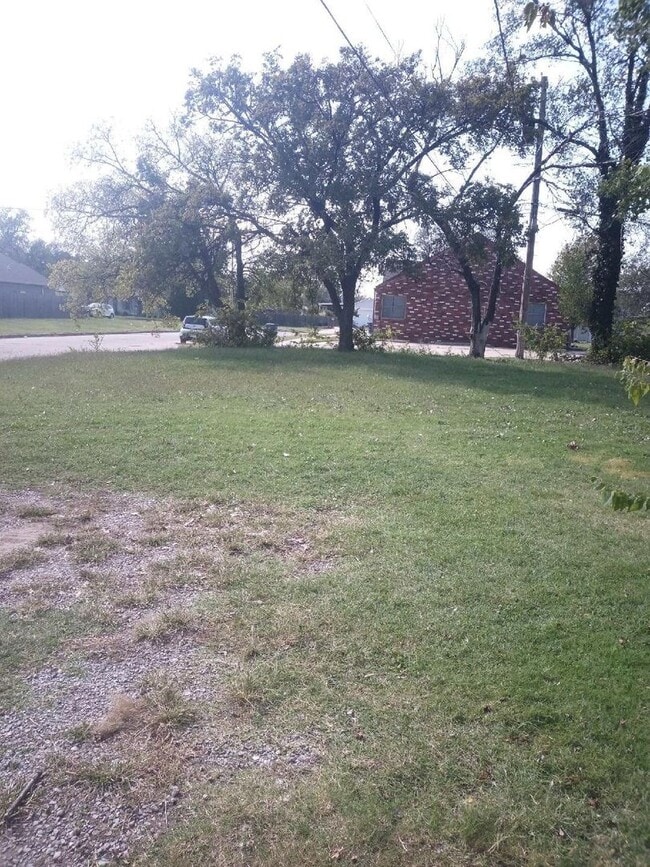 Primary Photo - Cozy 2-Bedroom Home with Large Yard & Stor...