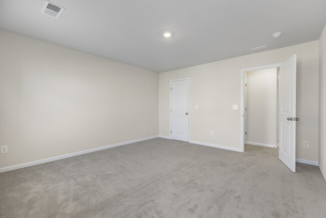 Building Photo - Brand-New 4-Bedroom/3-Full Bathroom Townho...