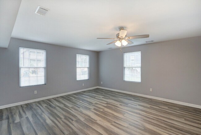 Building Photo - New Construction - Three Bedroom, Three Bathroom Home with yard & parking!