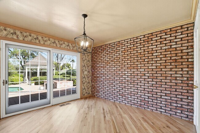 Building Photo - Stunning 3,488 Sq. Ft. Home with Pool & 3-...