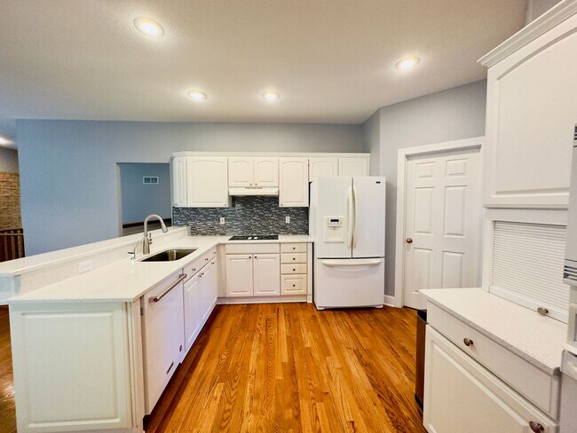 Building Photo - {6411} Enchanted Lake Estates + Updated Kitchen, Fresh Paint Throughout +  Main Floor Primary Bed...