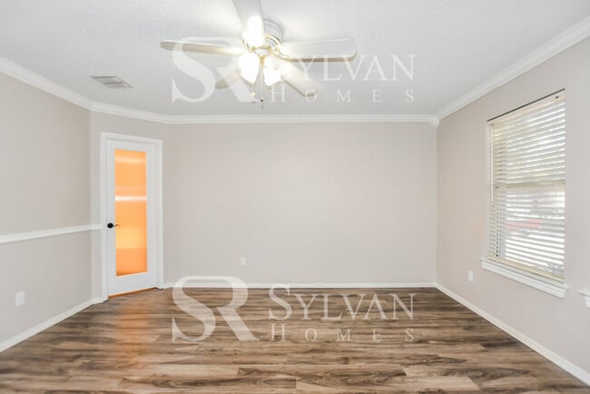 Building Photo - The living is easy in this gorgeous 4BR, 2.5BA brick home