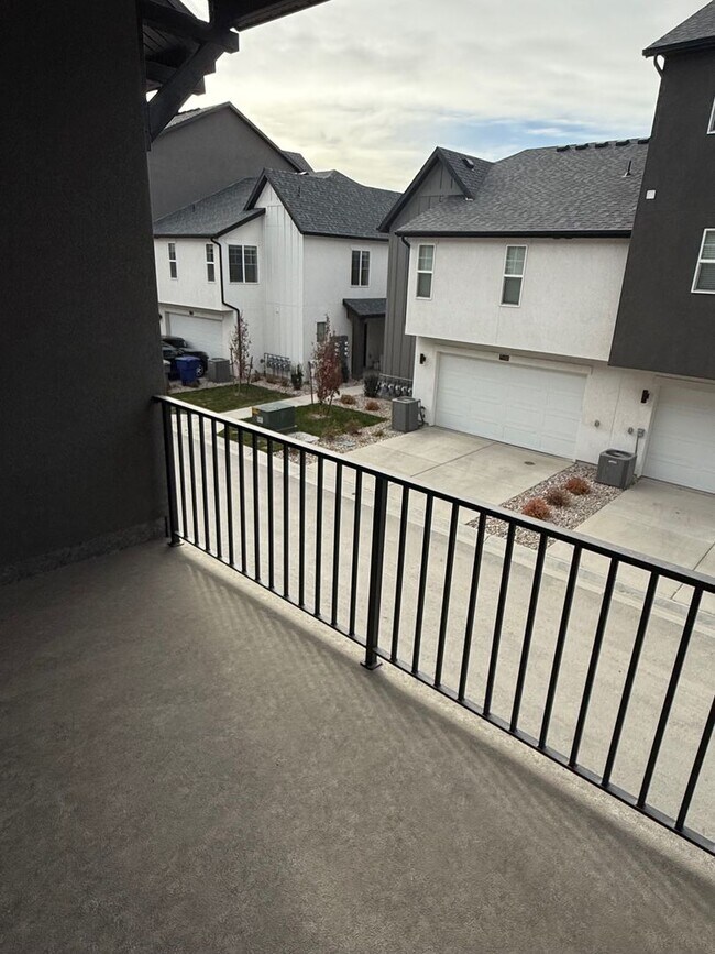 Building Photo - Half off first months rent - Beautiful townhome, construction just completed, 2 car garage, centr...