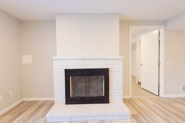 Building Photo - Spacious 3-Bedroom Attached Villa with Finished Basement & Private Fenced Yard!