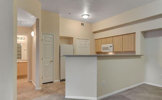 Building Photo - BEAUTIFUL 2 BED 2 BATH CONDO LOCATED ACROS...