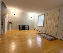 Building Photo - 10% off  1st month rent. Spacious 3 Bedroom, 2 Bath Townhouse with In-Unit Laundry in Lowell, MA