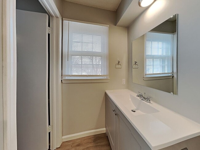 Building Photo - Spacious 4BR Home with Finished Basement, Fireplace & Unique Layout