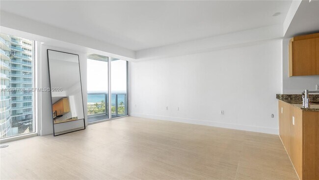 Building Photo - 10275 Collins Ave