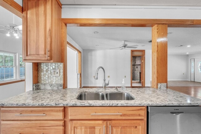 Building Photo - Charming home with large garage & attached...