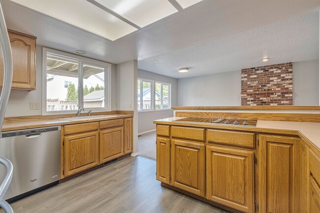 Building Photo - Spacious 5-Bedroom Home with Beautiful Bac...