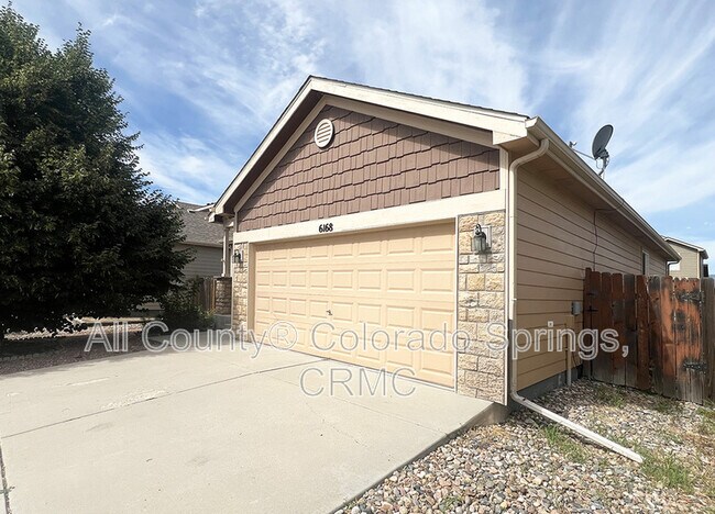 Building Photo - 6168 Rocking Chair Ln