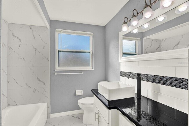 Building Photo - 7902 Canna Dr