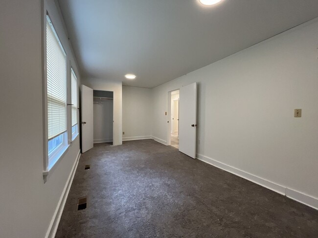 Building Photo - Expansive 4BR 2,900+ Sq Ft Home with Theater-Style Living Room & Bonus Hobby Workshop