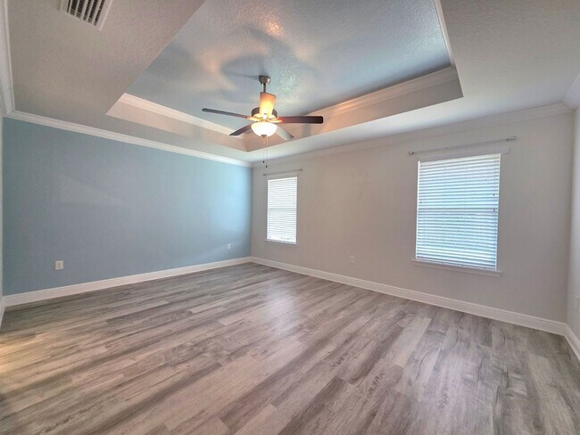 Building Photo - Bright, Open Layout | Screened Porch + Paver Patio | Move-In Ready