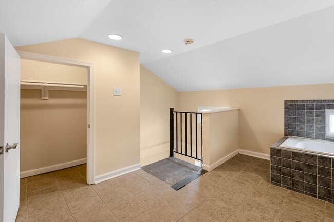 Building Photo - Spacious 2BR/2.5BA Townhome with Finished Basement & Extra Storage