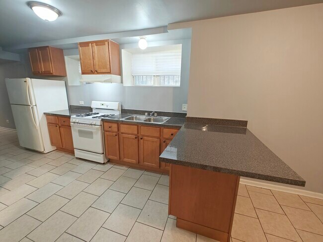 Building Photo - 6030 S Eberhart Ave