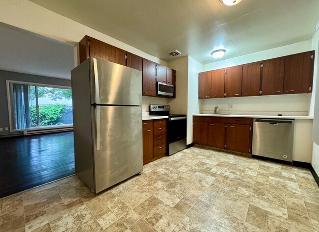 Building Photo - Reed Neighborhood Gem~ Great Natural Light~ Fenced Front Patio~ Onsite Laundry~ Off Street parkin...