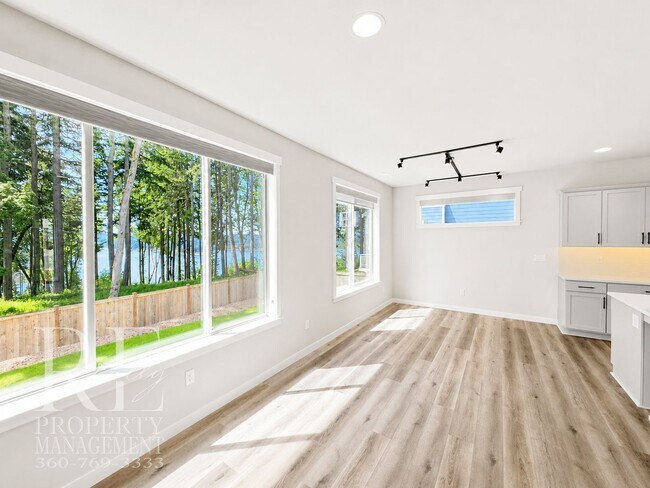 Building Photo - Luxury Poulsbo Retreat with Water Views, Covered Deck & Designer Finishes