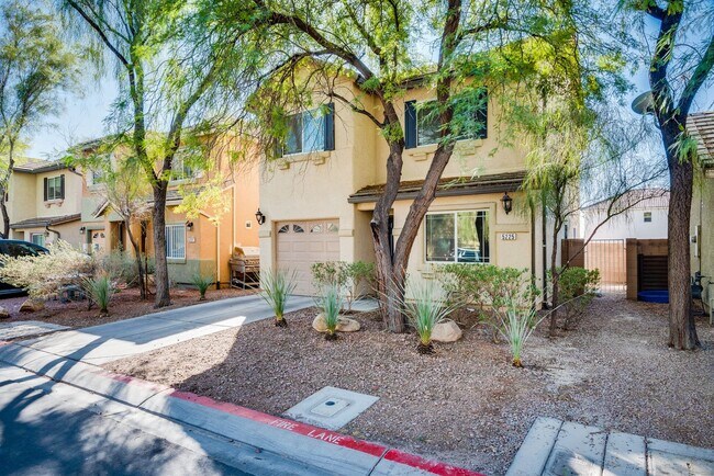 Building Photo - Very nice kept two-story 3 bedroom 2 bath house in a small gated community on the east side