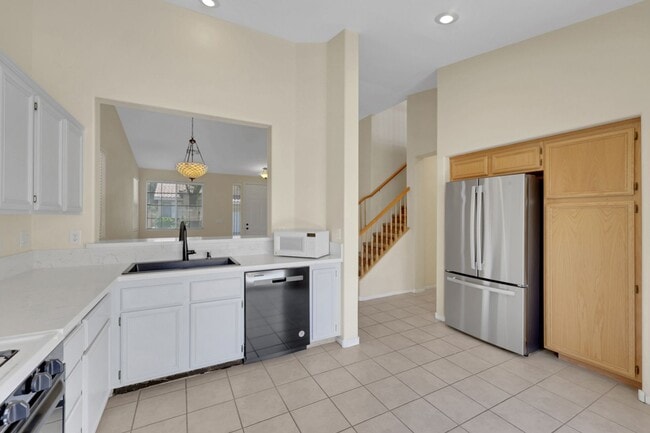 Building Photo - This beautifully updated 2-bedroom home is nestled in a gated community
