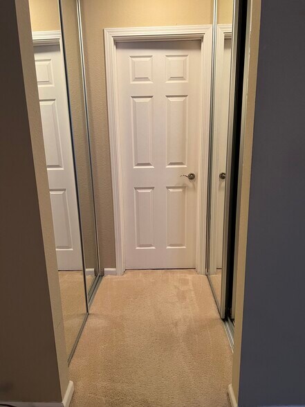 Master bedroom hallway with 2 mirrored closets - 880 E Fremont Ave