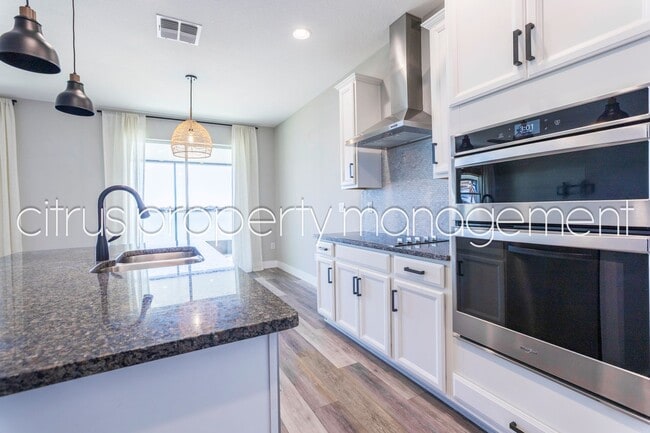 Building Photo - Stunning Double Waterfront 4/3 Home with Dock and Electric Boat Lift