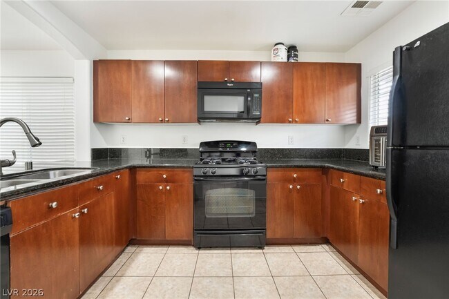 Building Photo - 9132 Gabardine Ave