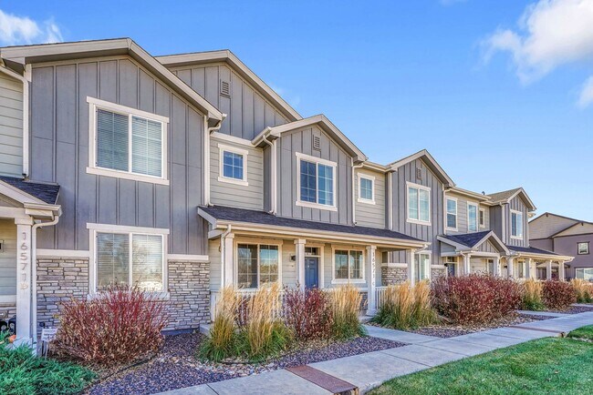 Building Photo - Former Model Home - Superb townhome in great location!