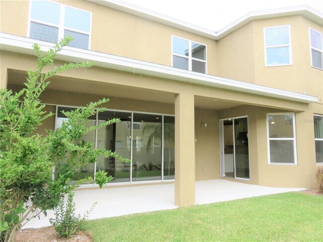 Building Photo - 8828 Tropical Palm Dr