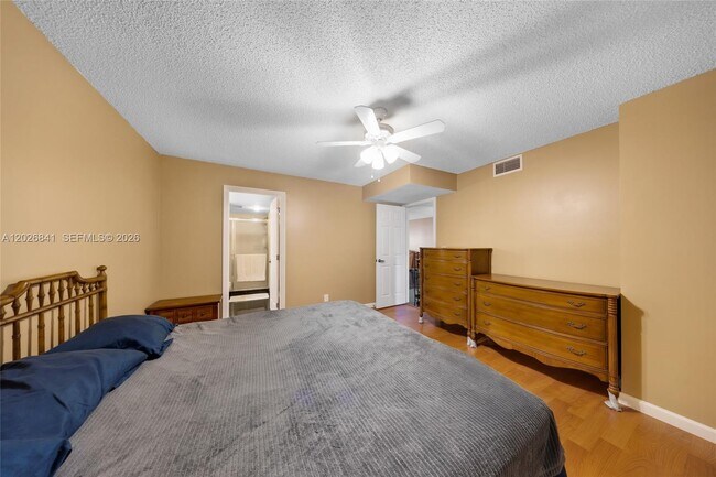 Building Photo - 6075 N Sabal Palm Blvd