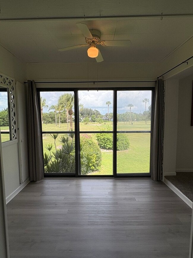 Building Photo - (55+) 2/2 Condo in the Peaceful Miles Grant Golf Course Community