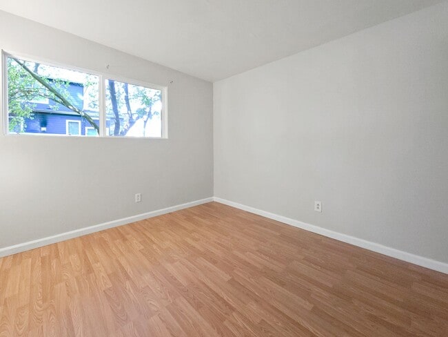 Building Photo - Bright Rambler in Quiet, Convenient Neighborhood