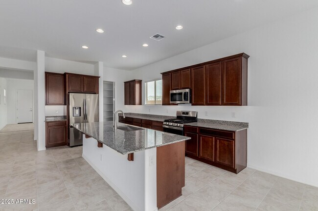 Building Photo - 8817 W Denton Ln