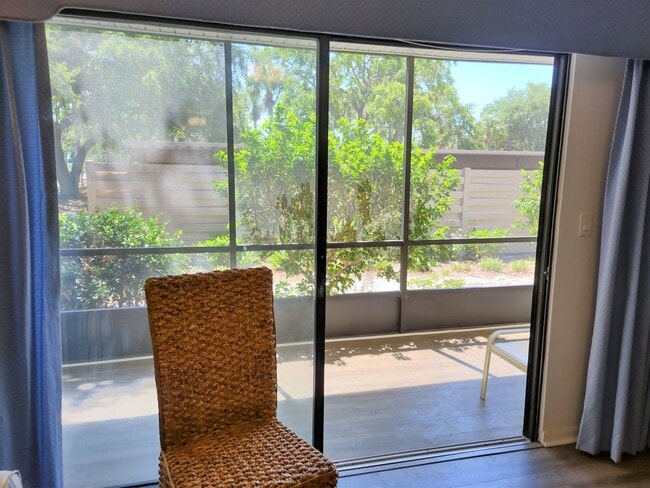 Building Photo - Bird Bay Village Annual Rental – Furnished 1st Floor Unit with Covered Parking