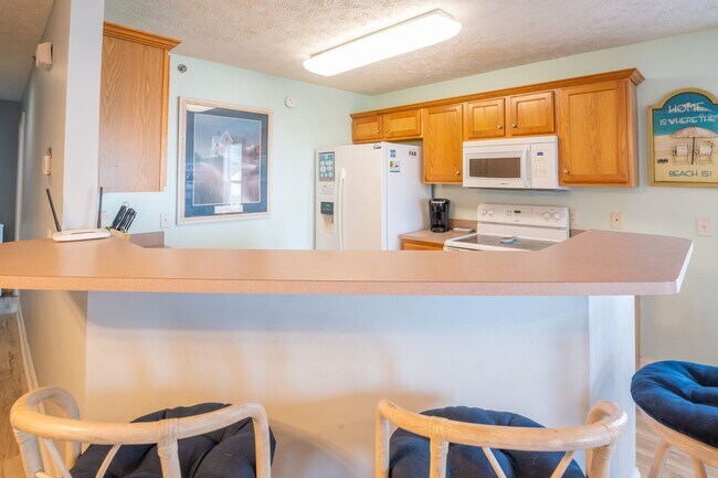 Building Photo - Sea Drift Carolina Breezin' @ 208 Carolina Beach Ave S #102