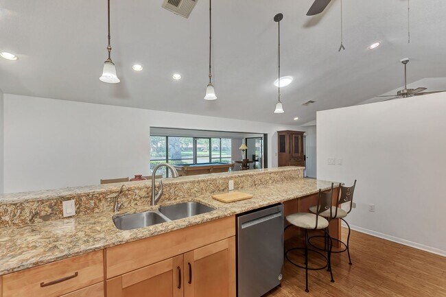 Building Photo - BEAUTIFUL 2 BEDROOM 2 BATHROOM + A DEN VILLA WITH GORGEOUS LAKE VIEWS!