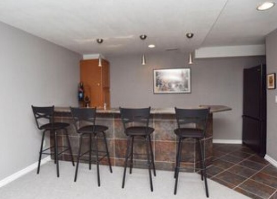 Fully finished basement has a wet bar next to living area--plus two bedrooms and 3/4 bathroom. - 429 Beaver Point