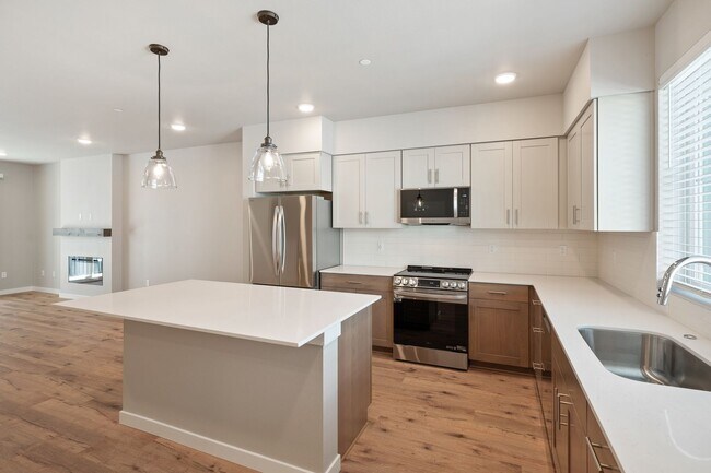 Building Photo - NEW CONSTRUCTION – Stylish 4-Bedroom Townh...