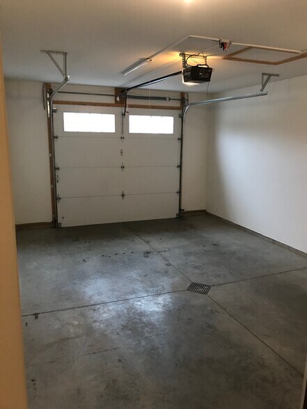 Single car attached garage is large for extra storage. - 1756 St Joseph St