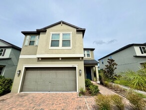 Building Photo - "Spacious 4-Bed Home with Granite Countert...