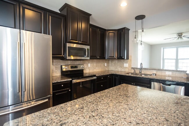 Building Photo - Exceptional 3-bedroom, 2.5-bathroom townhouse in the sought after community of The Villages at Cr...