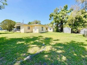 Building Photo - Charming 2 Bedroom Home with Fenced Yard & Screened Patio – Prime Location!